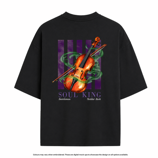 A black oversized t-shirt shown from the back, featuring a graphic print of an orange violin with green smoke and purple stripes, with the text 'SOUL KING' and 'Swordmaster Thriller Bark'.